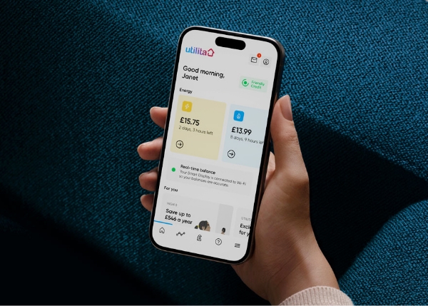 A customer using the My Utilita app to track their energy savings on the go after following our free Utilita High 5 tips.